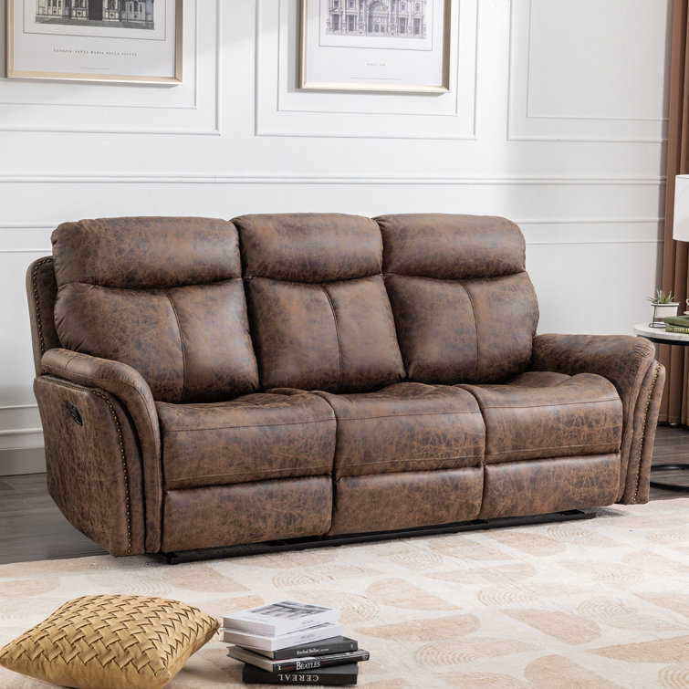 Leather reclining sofa with nailhead deals trim